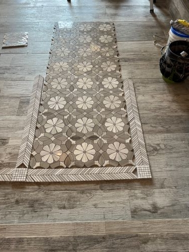 Mosaic tile floor for shower in progress Mosaic tile floor for shower in progress