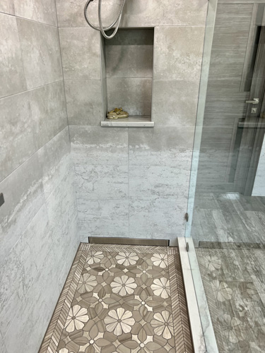 Step in shower with porcelain wall tiles Step in shower with porcelain wall tiles